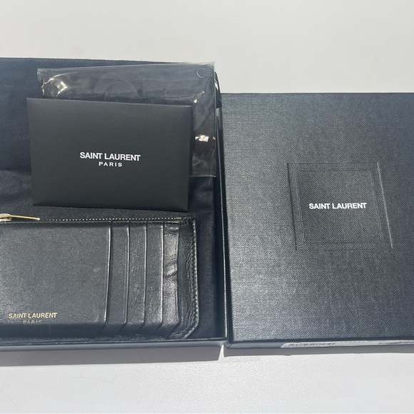 Yves Saint Laurent Handbags - ⭐️ 💯 YSL leather card holder with zipper. Multiple fold. Unisex 🔥🔥🔥